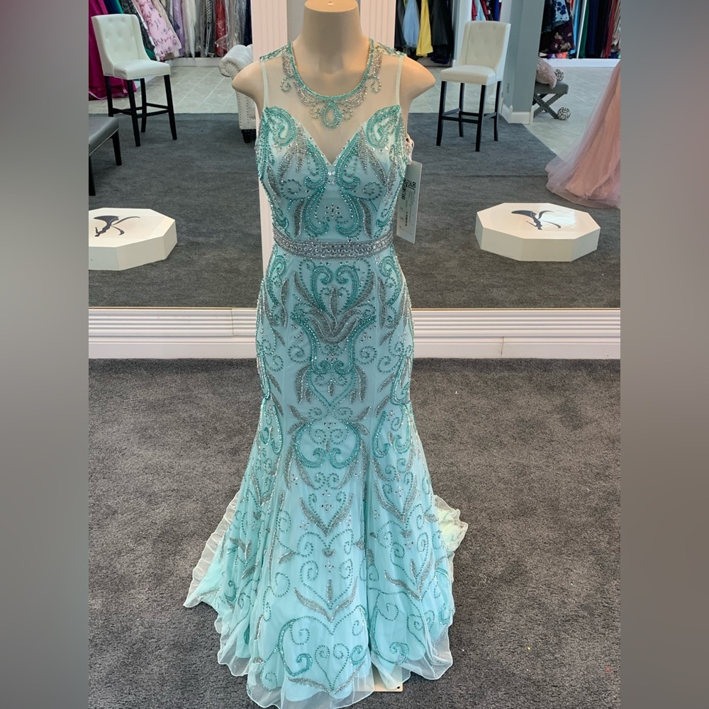 size 6. tiffany colored mermaid gown. fully jeweled keyhole back sheer neckline